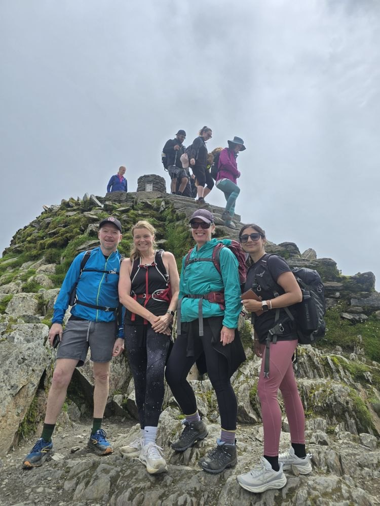 A group of hikers at the Snowdon summit