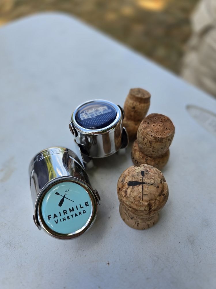Sparkling wine corks and caps on a table after a tasting